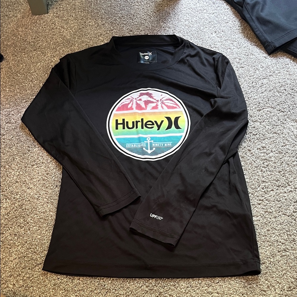 NWOT never worn Hurley Black Long Sleeve with Rainbow Logo UPF 50+